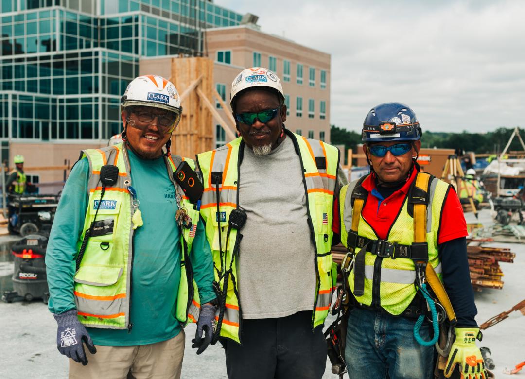 3 Clark craft workers at a jobsite in PPE